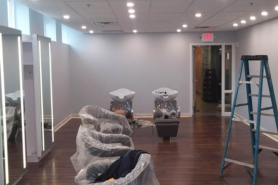 interior of salon and spa rejuvenation of freshly painted walls, trim and work areas