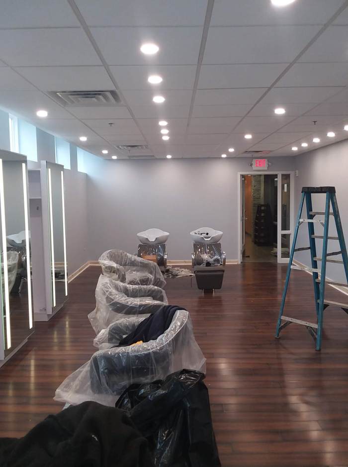 interior of salon and spa rejuvenation of freshly painted walls, trim and work areas